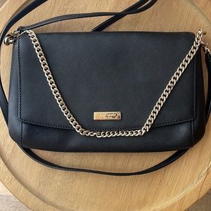 Black crossbody purse. With gold chain